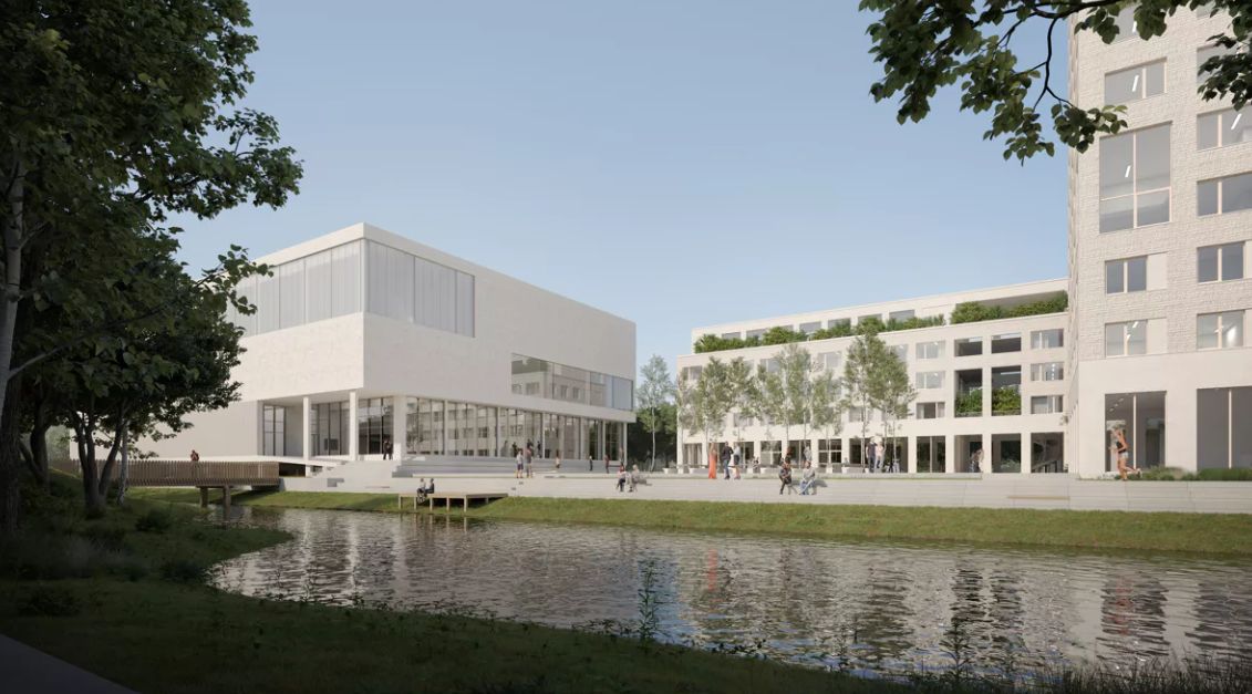 Wit utiliteitsgebouw aan het water